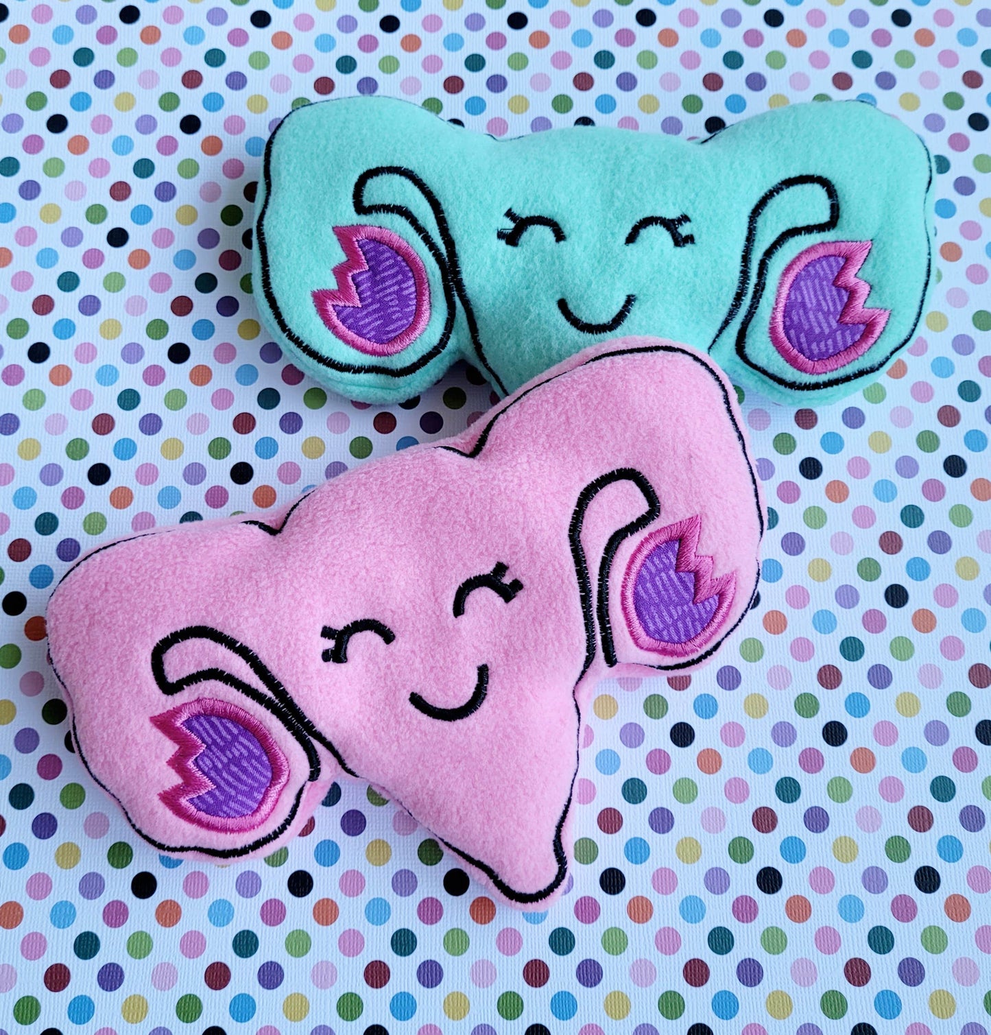 Uterus-Shaped Heat Pad - Adorable and functional! Microwaveable rice-filled uterus for soothing warmth. Perfect for comfort and relaxation