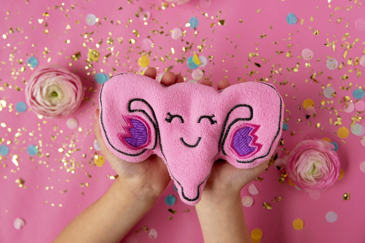 Uterus-Shaped Heat Pad - Adorable and functional! Microwaveable rice-filled uterus for soothing warmth. Perfect for comfort and relaxation