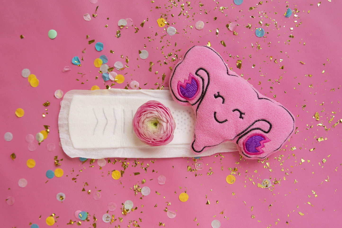 Uterus-Shaped Heat Pad - Adorable and functional! Microwaveable rice-filled uterus for soothing warmth. Perfect for comfort and relaxation