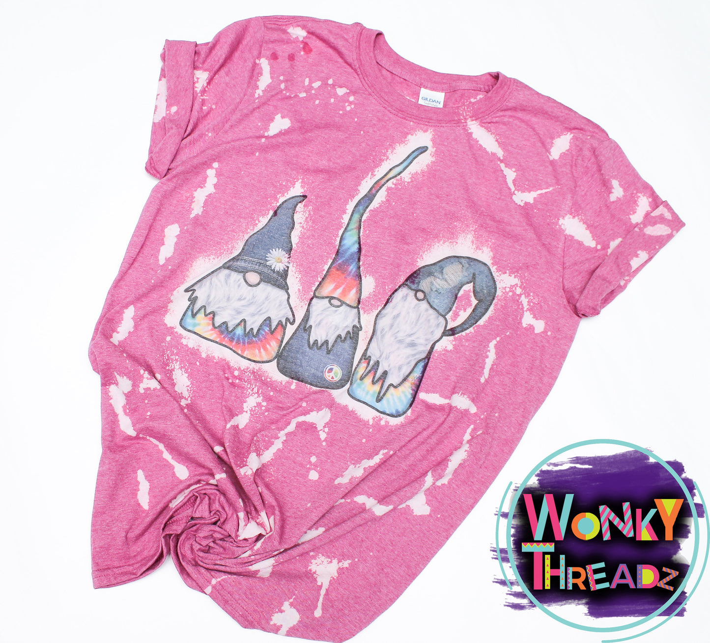 Tie Dye Gnome Distressed Tee - Elevate your style with this playful and colorful gnome-themed shirt. Perfect for adding a whimsical touch to your wardrobe."
